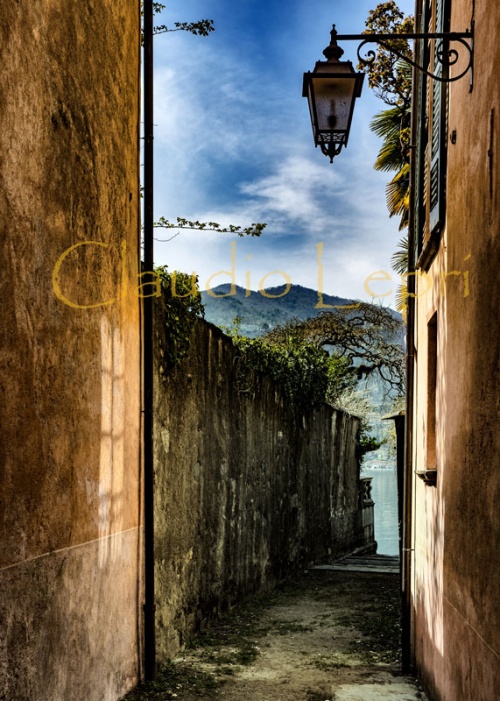 Alley to Orta Lake, Italy - This alley is one of the picturesque alleyways that a person can walk to go from the beautiful historical center of the village of Orta S.Giulio to the the coast of the Orta Lake.  The Orta Lake is a quite small lake in the Piedmont region in the North Italy.